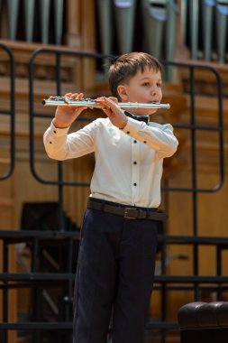 20.02.15, Moskova, Rusya. Bir grup genç flütçü müzik okulunda klasik beste yapıyor..