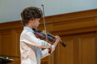 20.02.15, Moskova, Rusya. Müzik okulunun orkestra ve solistlerinin konseri Alekseev 'den sonra isimlendirildi.. 