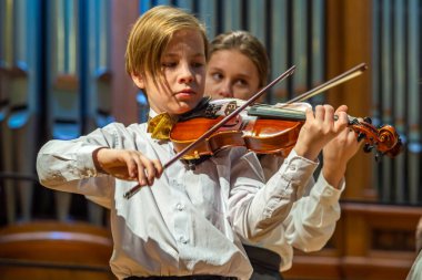 20.02.15, Moskova, Rusya. Müzik okulunun orkestra ve solistlerinin konseri Alekseev 'den sonra isimlendirildi.. 