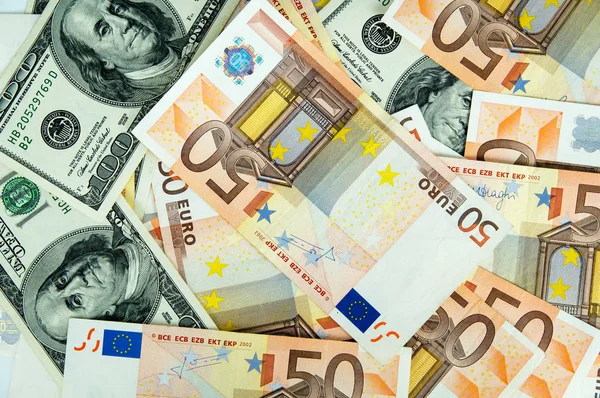 Monetaire achtergrond, de euro en de dollar — Stockfoto