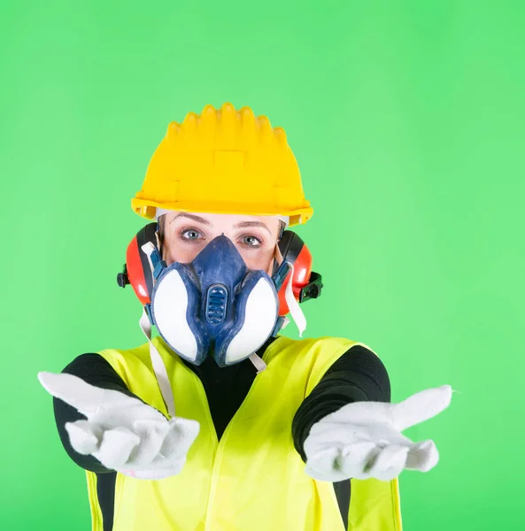 worker girl with gas mask and helmet