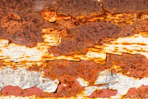 Rust and corrosion on a white metal background. Corrosion corros Stock Picture
