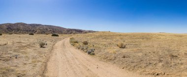 Çimenlikteki Çamuru Bükmek