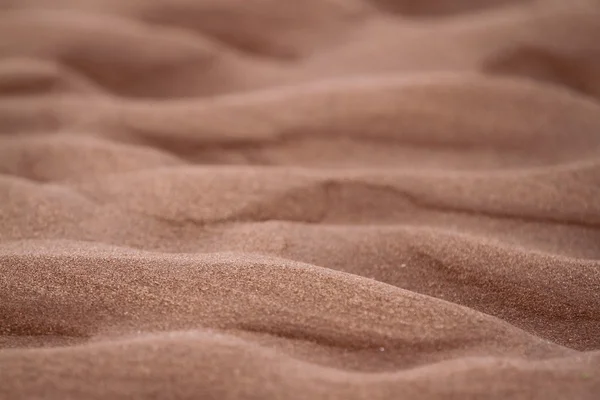 Kırmızı plaj kum dalgaların — Stok fotoğraf