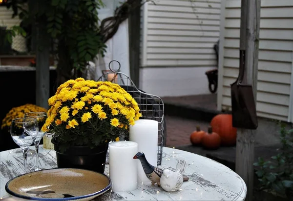 Close up of anoutdoor autumn display on a round white table — Stock Photo, Image