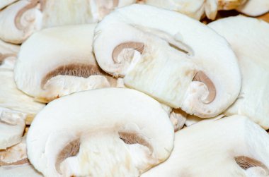 Sliced champignon mushrooms, ingredient of many delicious culina