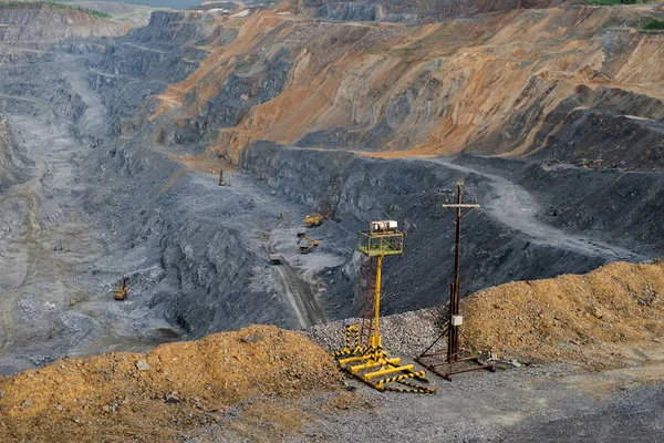 The temporary lighting against the backdrop of a open-pit mine. The quarry operation  is located in the village of Belogorsk, Kemerovo region. Siberia, Russia.