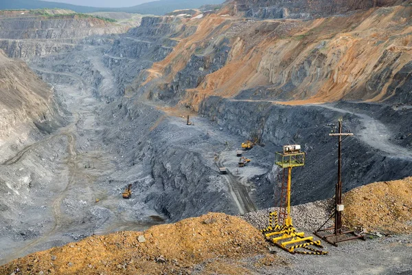 Temporary lighting against the backdrop of a open-pit mine. The quarry operation  is located in the village of Belogorsk, Kemerovo region. Siberia, Russia.