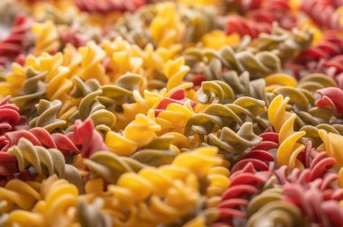 Gnocchetti multicolored pasta background concept. Diet and healthy food concept