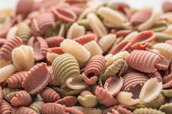 Concepto de fondo de pasta multicolor Gnocchetti. Concepto de dieta y alimentos saludables —  Fotos de Stock