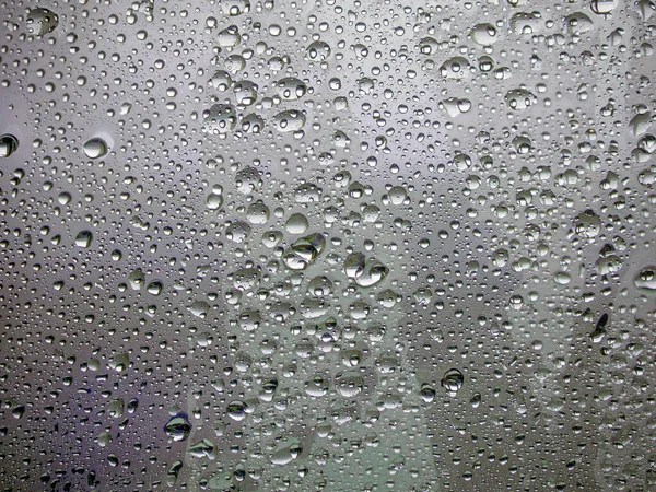 Frozen glass. Water drops