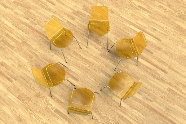 A circle of empty yellow chairs
