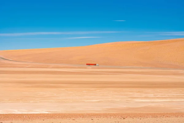 Truck on the desert on the road to Paso Jama (border with Argentina) in the Altiplano (high Andean plateau) at an altitude of 4200m, Atacama desert, Chile, South America