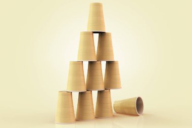 3D rendering of plastic cups stacked in a pyramid with one fallen down representing the concept of failure at teamwork. clipart