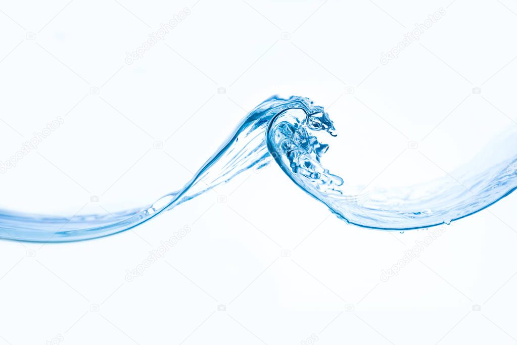 Wave of water against a white background
