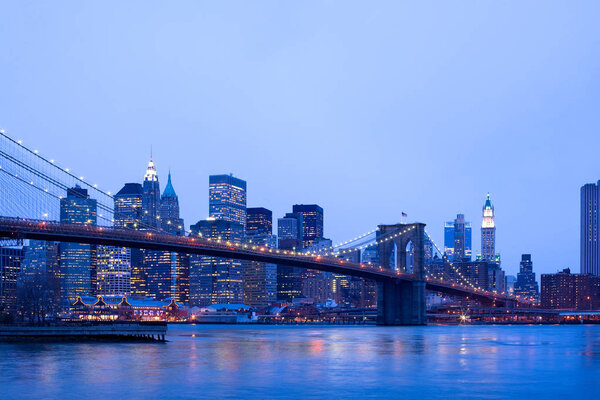 Brooklyn Bridge over the East River and downtown skyline, Manhattan, New York City, New York, United States