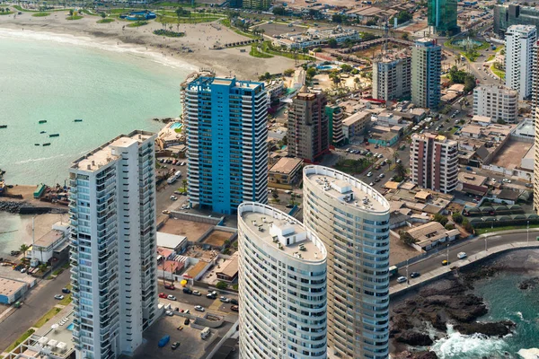 Aerial view of apartment buildings at La Peninsula and Cavancha Beach at the port city of Iquique in northern Chile