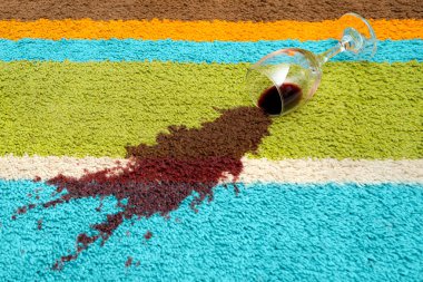 Spill of red wine over the carpet clipart