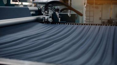 Textile Manufacturing. Circular knitted fabric. Textile factory in spinning production line and a rotating machinery and equipment production company. Clothing industry. Manufacturing textile fabrics.