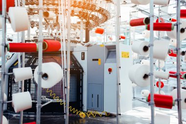 Textile Manufacturing. Circular knitted fabric. Textile factory in spinning production line and a rotating machinery and equipment production company. Clothing industry. Manufacturing textile fabrics.