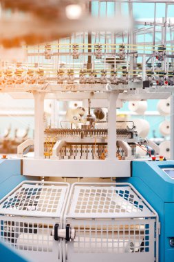 Textile Manufacturing. Circular knitted fabric. Textile factory in spinning production line and a rotating machinery and equipment production company. Clothing industry. Manufacturing textile fabrics.