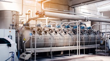Textile Manufacturing. Circular knitted fabric. Textile factory in spinning production line and a rotating machinery and equipment production company. Clothing industry. Manufacturing textile fabrics.