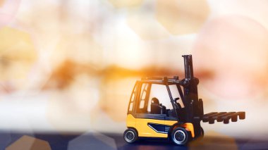 Forklift loader close up. Pallet stacker truck equipment at warehouse.