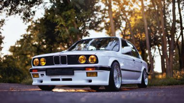Original BMW M3 e30 outdors, sport wheels, tunning, glossy and shiny old classic retro oldtimer. clipart