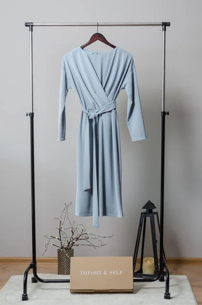 dress on hangers on garment rack