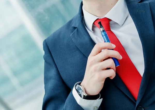 Portrait of cheerful guy smoking with e-cigarette — Stock Photo, Image