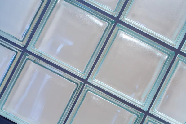 Uno sfondo muro di mattoni di vetro. Architettura interna . — Foto Stock