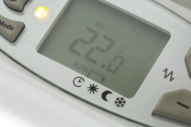 closeup of modern radiator with digital temperature clipart