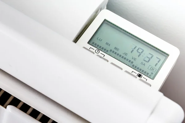 Closeup of modern radiator with digital timer — Stock Photo, Image