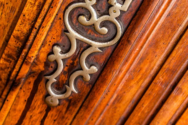 Vintage keyhole on wooden surface — Stock Photo, Image