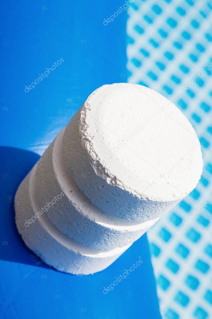 Chlorine Pellets on the edge of an inflatable pool