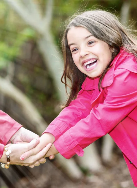 Happy pretty little girl playing with her mother — Stock Photo, Image