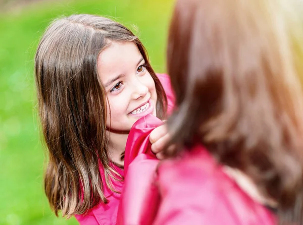 Happy pretty little girl playing with her mother — Stock Photo, Image