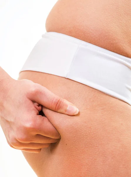 Close up woman checking cellulite on her buttocks — Stock Photo, Image