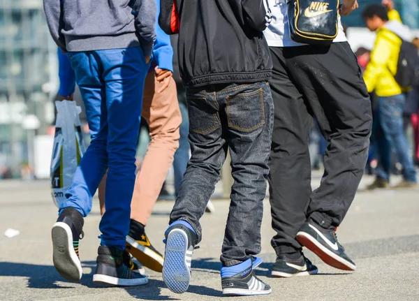 La defense, France- April 09, 2014: Group of multiethnic youth wearing brand clothes and shoes — 图库照片