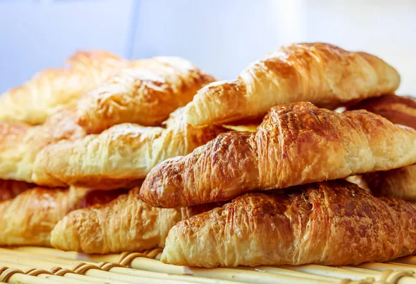 Closeup on croissants with butter in french pastry shop — Stock Photo, Image