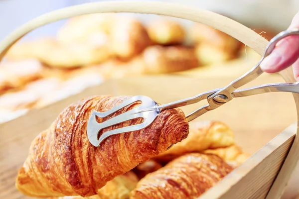 Closeup on croissants with butter in french pastry shop — Stock Photo, Image