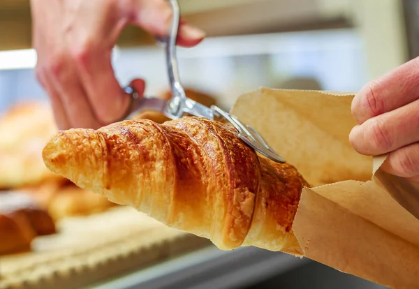 Closeup on croissants with butter in french pastry shop — Stock Photo, Image