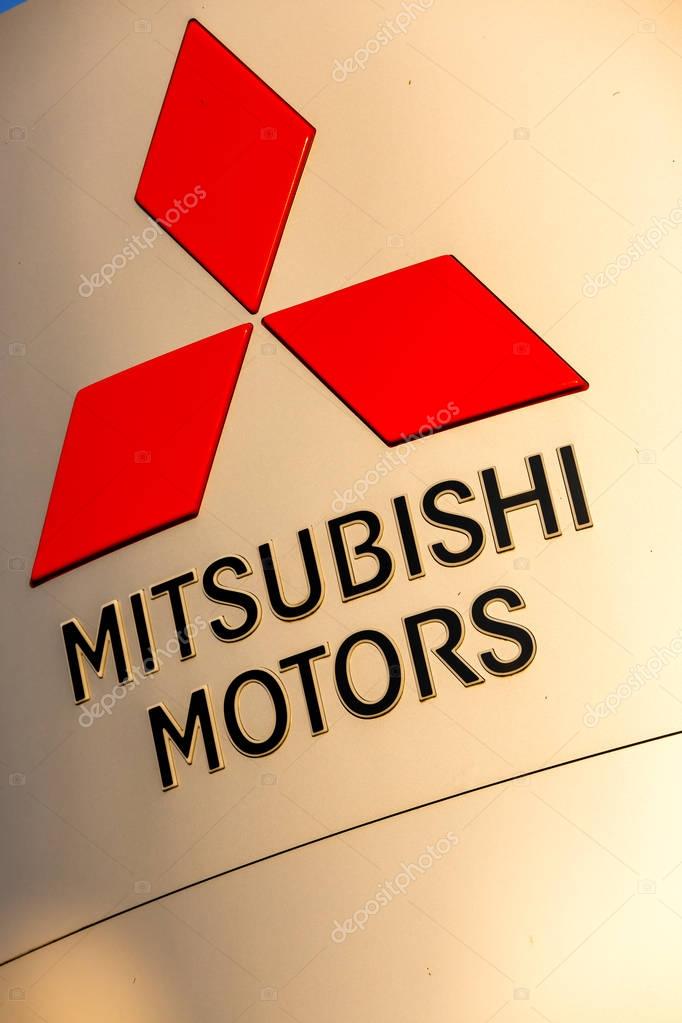 SAMARA, RUSSIA - MAY 14, 2016: Official dealership sign of Mitsubishi against the blue sky. Mitsubishi Motors Corporation is a Japanese automotive manufacturer