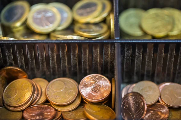 Open cash registrer containing many coins of euro ans banknotes — Stock Photo, Image