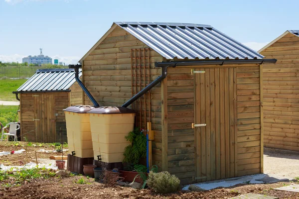 Green recovery of rainwater outside in town garden