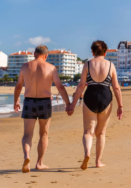 Saint-Jean de Luze, France - Sept 28, 2016: middle age couple wa — Zdjęcie stockowe