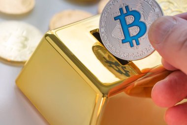 Cryptocurrency fiziksel bitcoin külçe altının kumbara ile kavramı