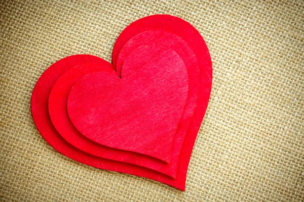 Heart isolated on a burlap fabric. Valentines Day and love concept — Stock Photo, Image