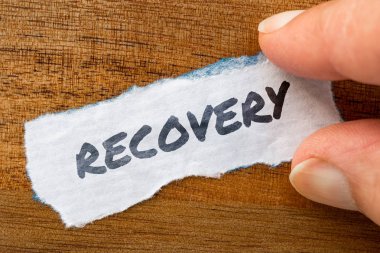 Word kurtarma kavramı ve grunge arka plan üzerinde eski kağıt üzerinde yazılı Tema