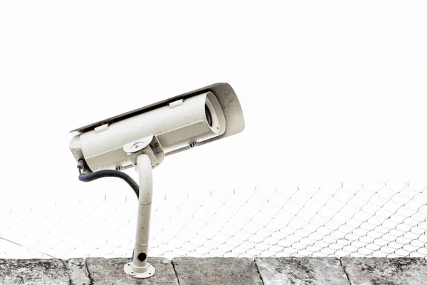 Surveillance camera fixed on the wall of a prison Royalty Free Stock Photos